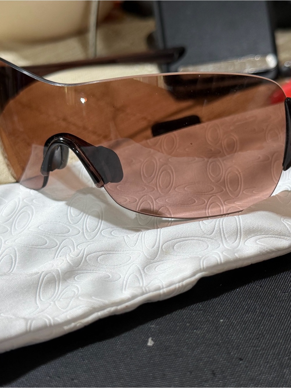 Oakley Rimless Sunglasses with Brown Lenses